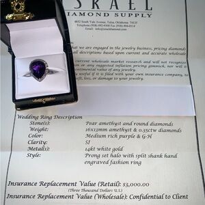 NWpaperwork. Pear Amethyst and round diamond ring.